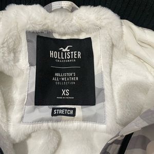 Barely worn winter jacket for girls! White and black camo.
